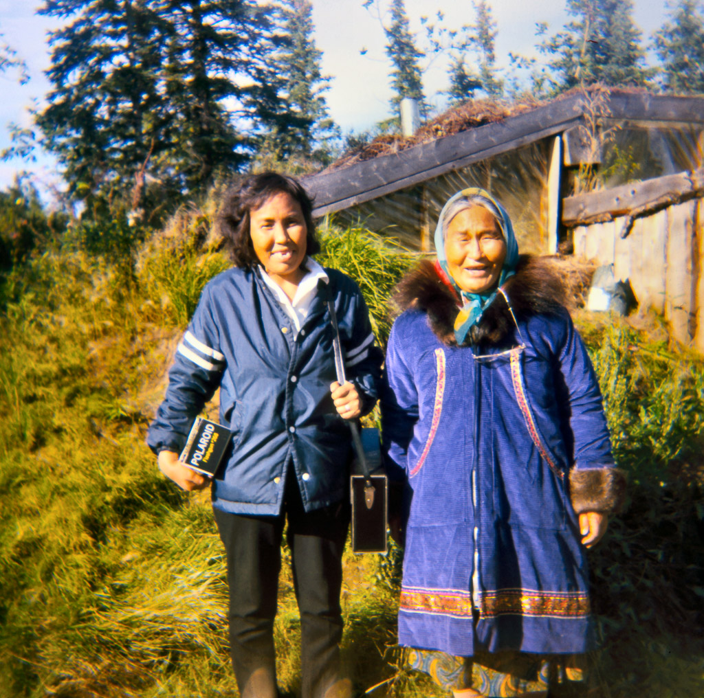 1969 Sarah Tickett and Dora Johnson in summer in front of our house.