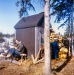 122-Boys-study-against-warm-wall-of-outhouse1968