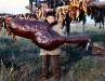1950s Boy with dried beluga whale belly. Kotzebue AK.
