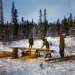 1960s Gary, Oliver and Dorene sawing lumber at our sawmill.