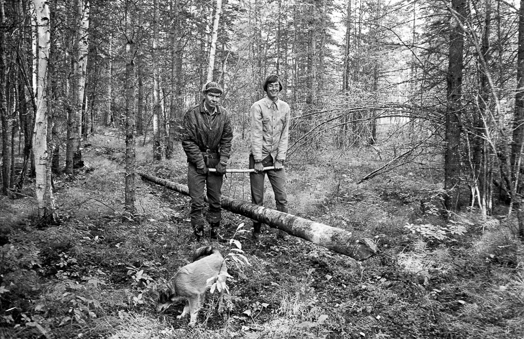 1978 Oliver and friend moving a log