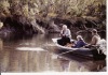 photo from Heidi, Oliver with ?? in small river boat with outboard motor
