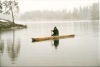 Oliver in one of the dug out canoes he made from a standing tree at Dammann's camp near Oslo Norway