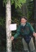 Oliver collecting birch sap for syrup