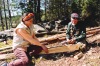 Oliver Cameron with friend, building raft, Norway