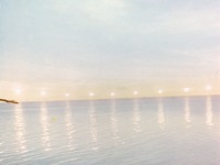 1960s Midnight sun in front of Kotzebue.