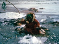 1964? Olive Cleveland jigging for grayling.