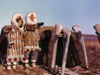 Chester Saavok and wife by sod house.