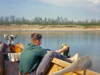 Late-1960s-Gerald-in-our-boat.-Very-small-outboard-engine.-Perhaps-3-HP-tif