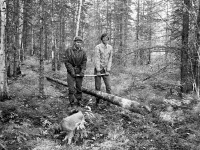 1978 Oliver and friend moving a log