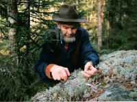 Image 9OliverCuttingReindeerMoss