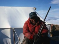 David Williams, Carrie Uhl's brother by tent at Sealing Point by Ken Ross May 1967.